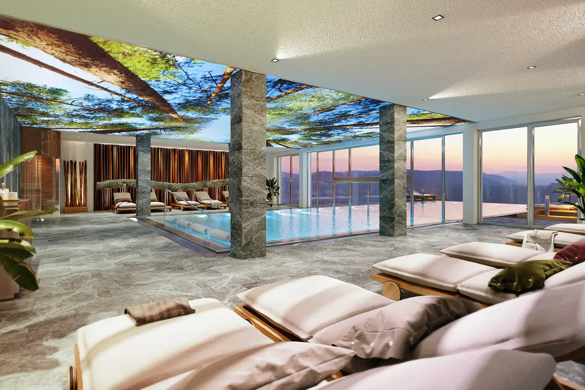 ALMGUT Mountain Wellness Hotel — Sommer-Außenansicht mit Lungauer Bergpanorama